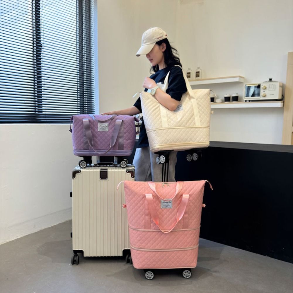 Nuevo Paquete de lona de tela  - Foldable Rolling Luggage Bag reseña y precio